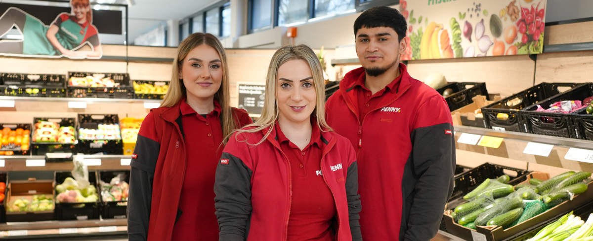 Three employees in the vegetable department