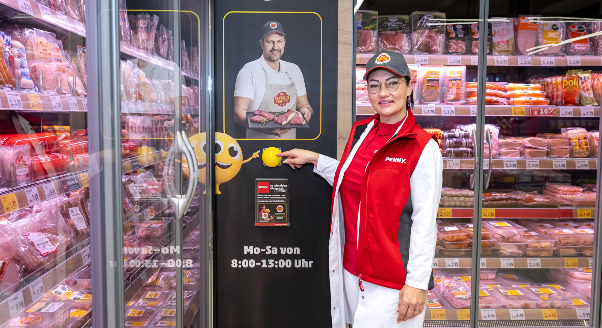 An employee in front of a shelf