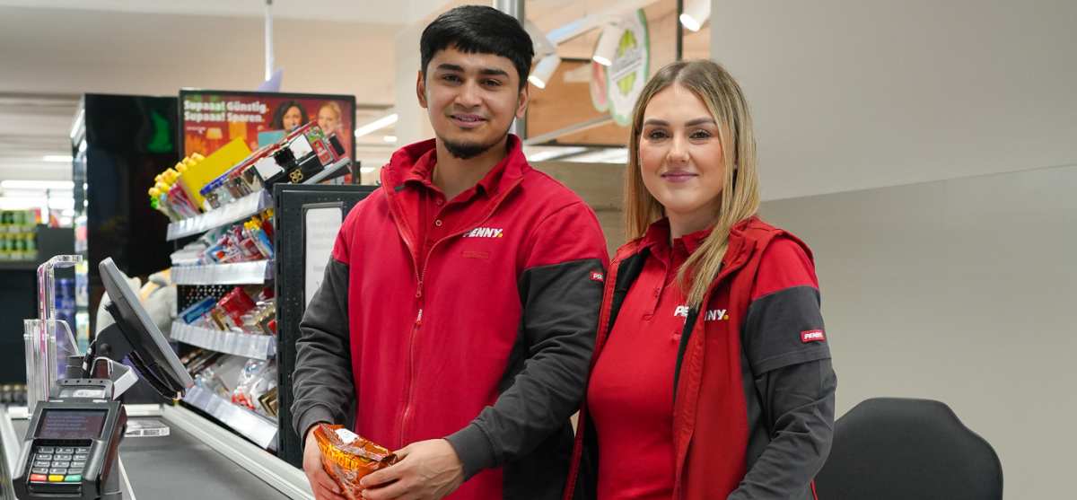 Two smiling employees